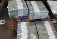 Police return GH¢85,000 found on highway to owner